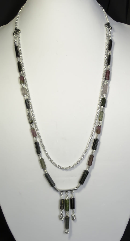 tourmaline faceted tubes (approx 127 carats), sterling silver focal bar and clasp. sp beads and chain