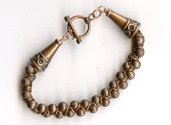 Antiqued Copper beads and cones, copper toggle clasp